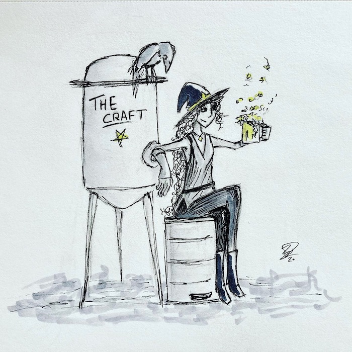 Rebecca enjoys a nice, cold mug of her own craft brew.